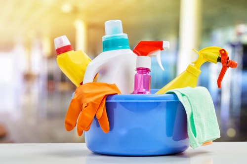 Carpet cleaning team preparing equipment safely before a job